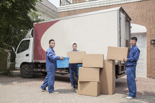 A local removals team loading a van for a Swiss Cottage home move