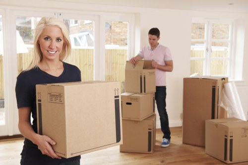 Prepared moving boxes and furniture for a Swiss Cottage house removal