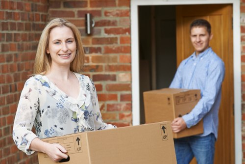 Office removals team preparing desks and boxes for a Swiss Cottage business move