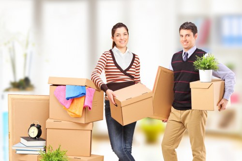 Careful wrapping and labelling of household items for moving