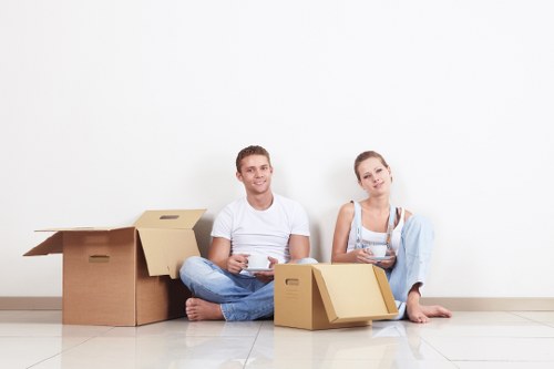 Careful packing of office equipment and files for relocation in Swiss Cottage