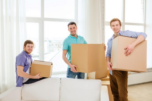 Packed boxes and furniture ready for transport in North West London