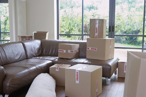 Local moving team handling boxes and furniture in Swiss Cottage